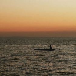 Scenic view of sea at sunset