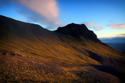 Scenic view of mountains against sky during sunset