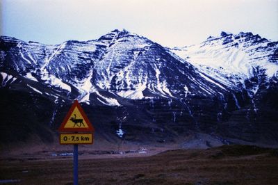Scenic view of snow covered mountains