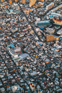 High angle view of illuminated buildings in city