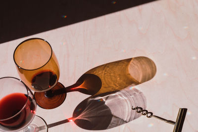 High angle view of sunglasses on glass table