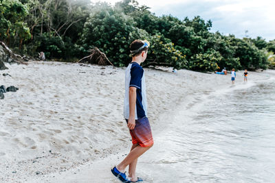 Woman walking on beach