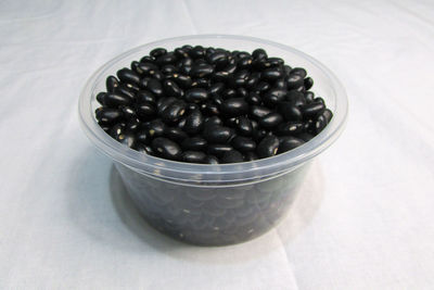 High angle view of blueberries in bowl on table