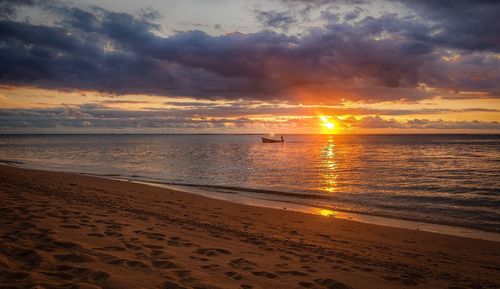 Scenic view of sea at sunset