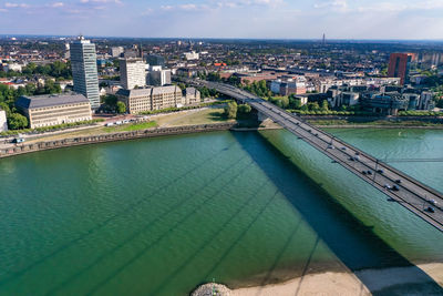 High angle view of river amidst buildings in city