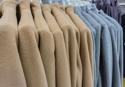 Close-up of warm clothing in store