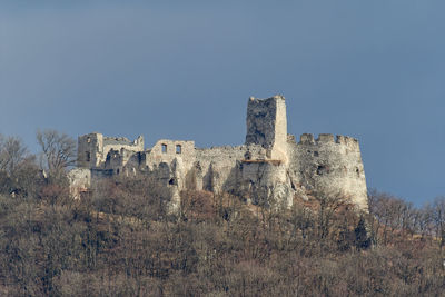 Low angle view of historic building against clear sky