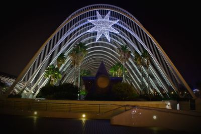 View of illuminated ferris wheel at night