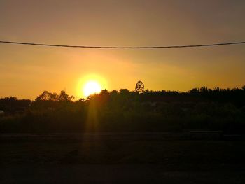 Scenic view of silhouette landscape against sky during sunset