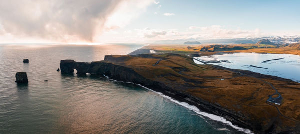 Aerial view of the iceland coastline by the black beach.