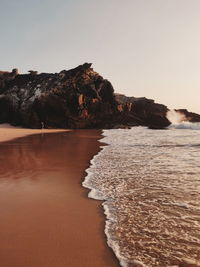 Scenic view of sea against clear sky