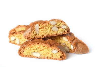 Close-up of bread against white background