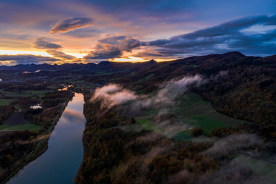 Scenic view of mountains against dramatic sky