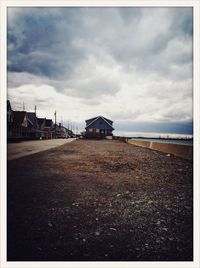 Built structure against cloudy sky