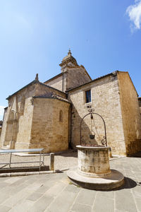 Low angle view of old building against sky
