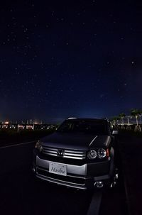 Car against sky at night