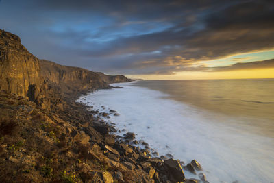 Scenic view of sea against sky during sunset