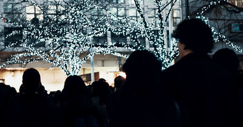 Silhouette people at night