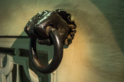 Close-up of metal sculpture on wall