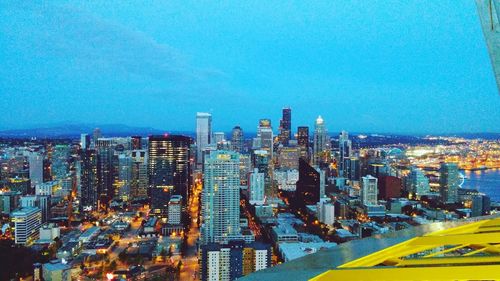 City lit up at dusk