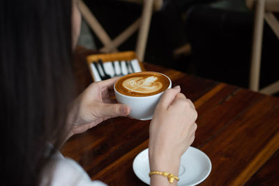 Coffee cup on table