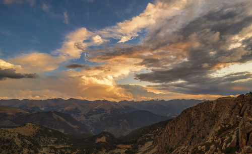 Scenic view of mountains against sky during sunset