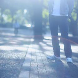 Low section of man standing on floor