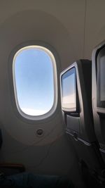 Sky seen through airplane window