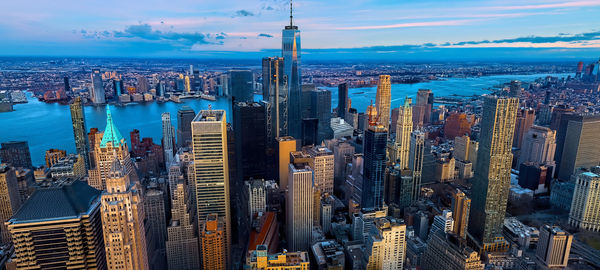 Aerial view of modern buildings in city against sky,new york city