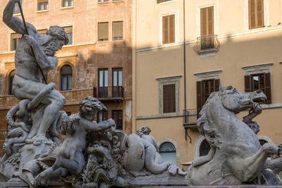 Neptune fountain in verona square in the city of rome in italy