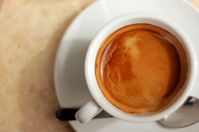 Close-up of coffee cup on table