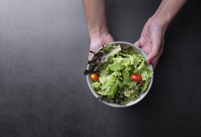 High angle view of person preparing food in bowl