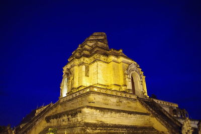 Low angle view of temple against clear blue sky