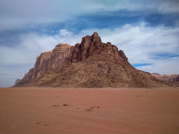 Rock formations in desert against sky