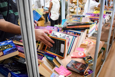 New delhi, india, september 09 2023 - variety of books on shelf inside a book-stall at delhi, india