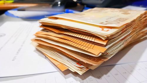 Close-up of currency on table