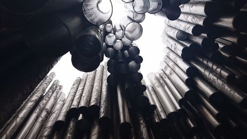 Low angle view of lanterns hanging on ceiling in building