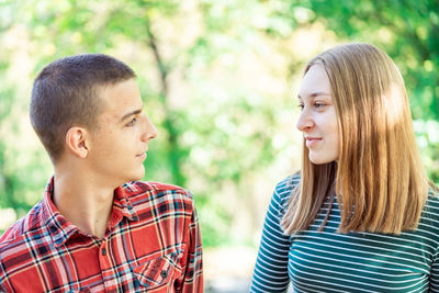 Side view of young woman looking away