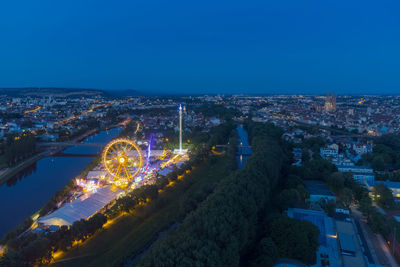 High angle view of illuminated cityscape