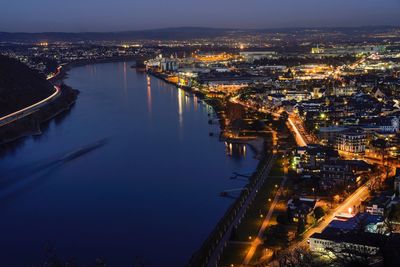 High angle view of illuminated city buildings at night