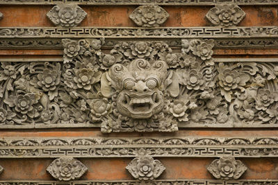 Close-up of carving on wall