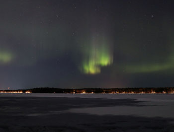 Scenic view of sea against sky at night