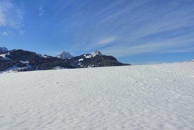 Clear blue sky and snow with mountain in background switzerland gstaad pure clean winter scene 