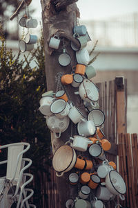 Close-up of lighting equipment hanging on wood