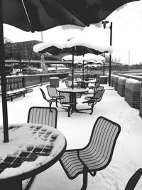 Close-up of chairs against sky