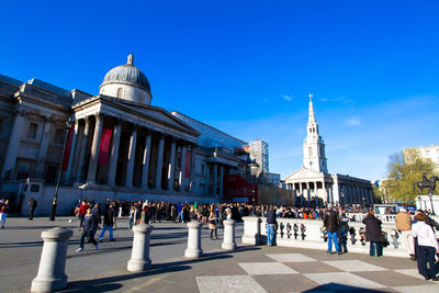 View of buildings against blue sky