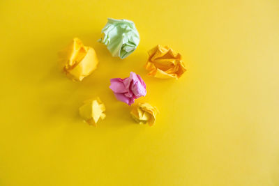 Close-up of flowers over yellow background