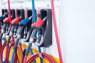 Close-up of multi colored fuel pumps