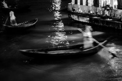 Boats moored on shore