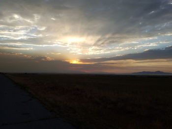 Scenic view of landscape against sky during sunset